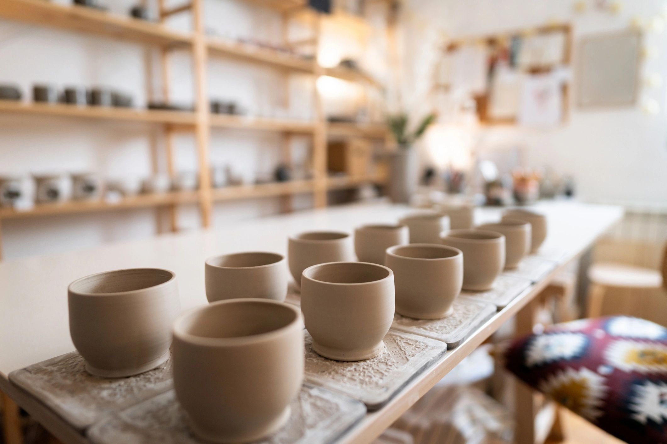 Ceramic works displayed in a pottery studio