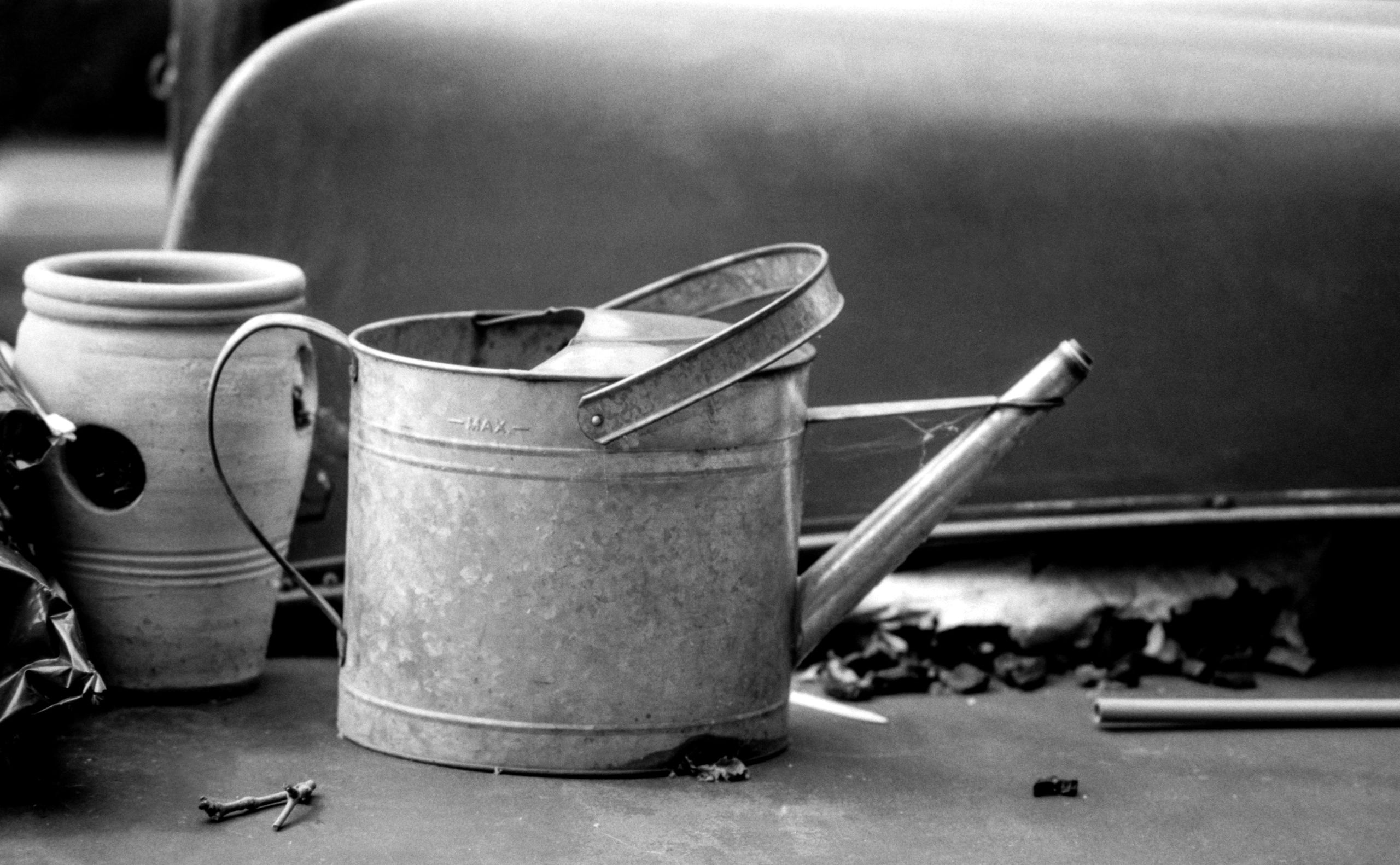 Vintage clay vessel and object study in monochrome