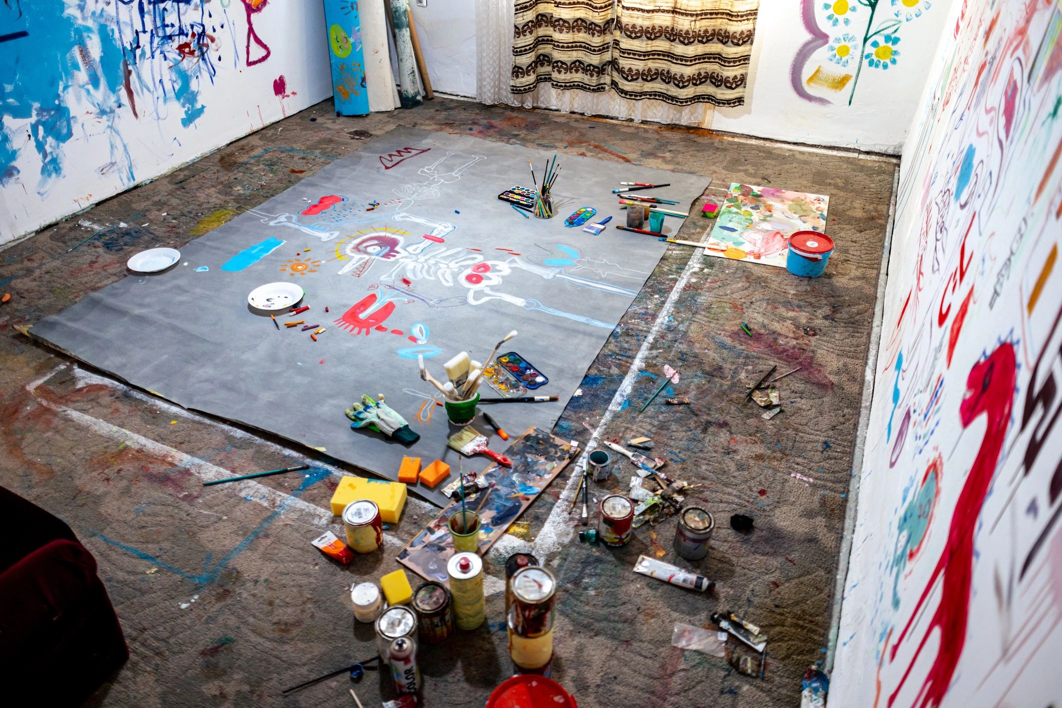 Creative art studio with large abstract work in progress