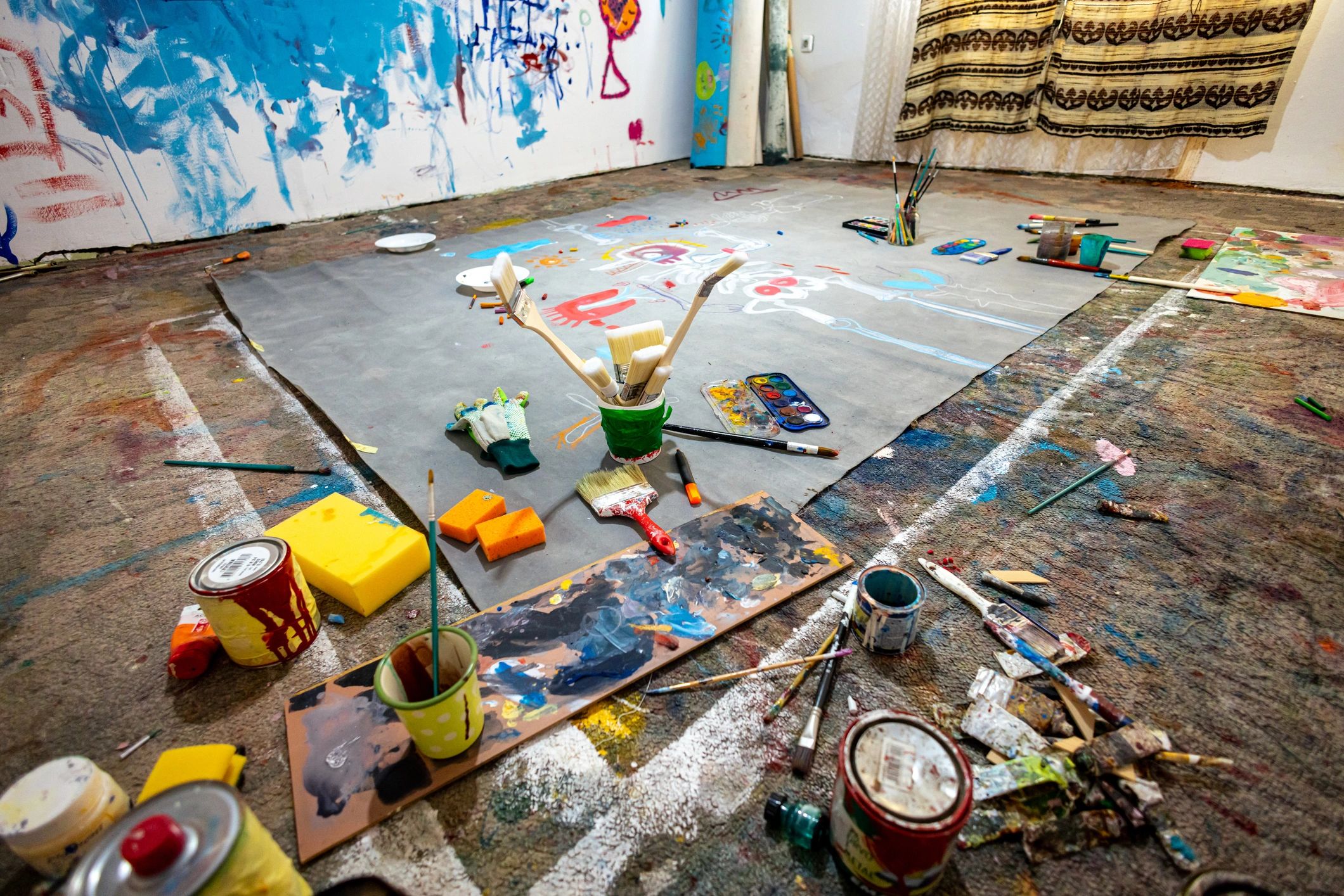 Creative art studio with large abstract painting